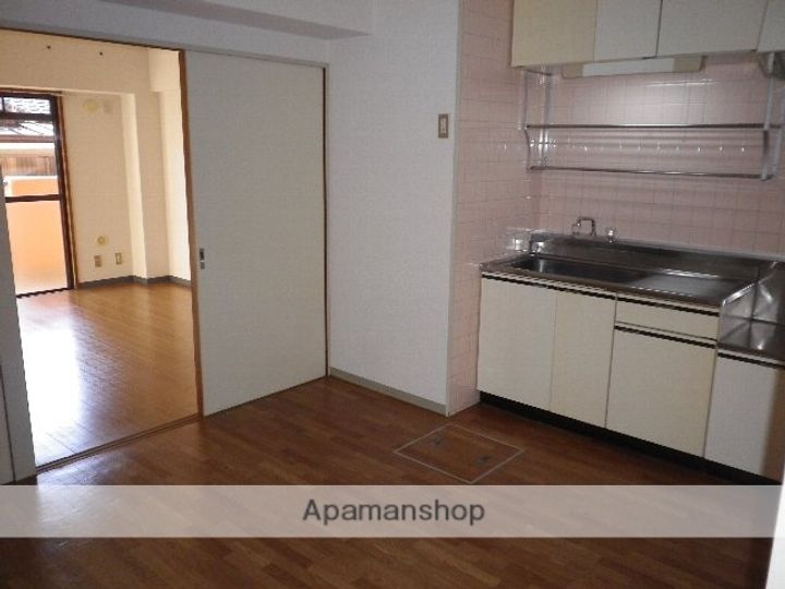 ハイツ北外山103の居間