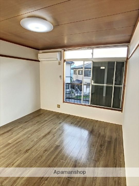 ハイツ山本207の居間