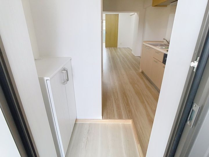 メゾン南参道202の玄関