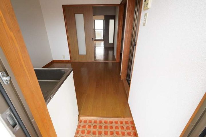 コーポ法成寺202の玄関