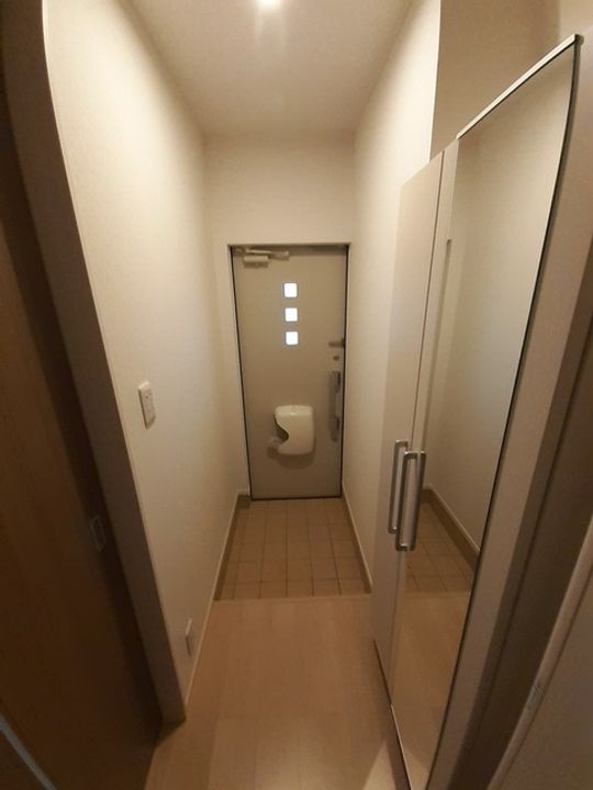Nリシェス羽塚の玄関