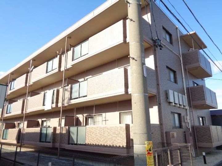三重県桑名市長島町又木の賃貸マンションの外観