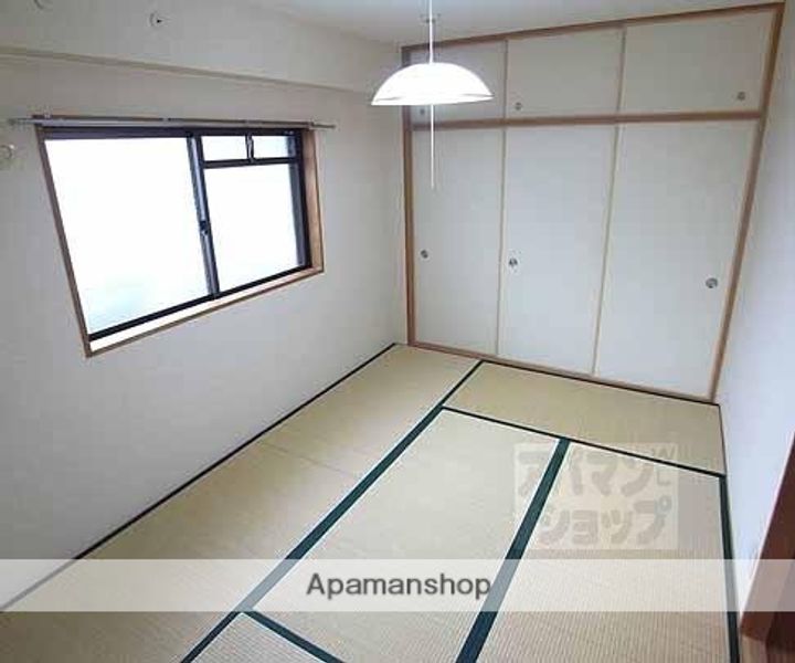 トーシンハイツ桃山301の居間