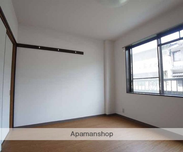 メゾンユーコーク301の居間