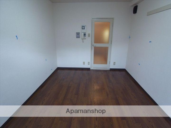 ライオンズマンション鴨川北108の居間