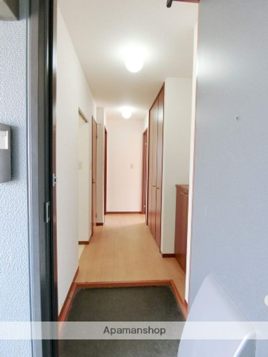 京都府木津川市木津川原田の賃貸アパート201の玄関