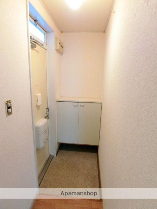 京都府城陽市水主塚ノ木の賃貸アパート103の玄関