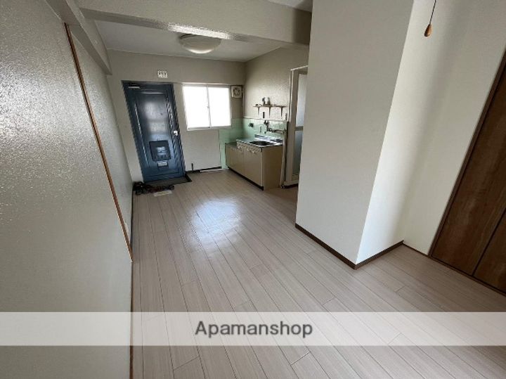 京都府京田辺市大住関屋の賃貸マンションの居間