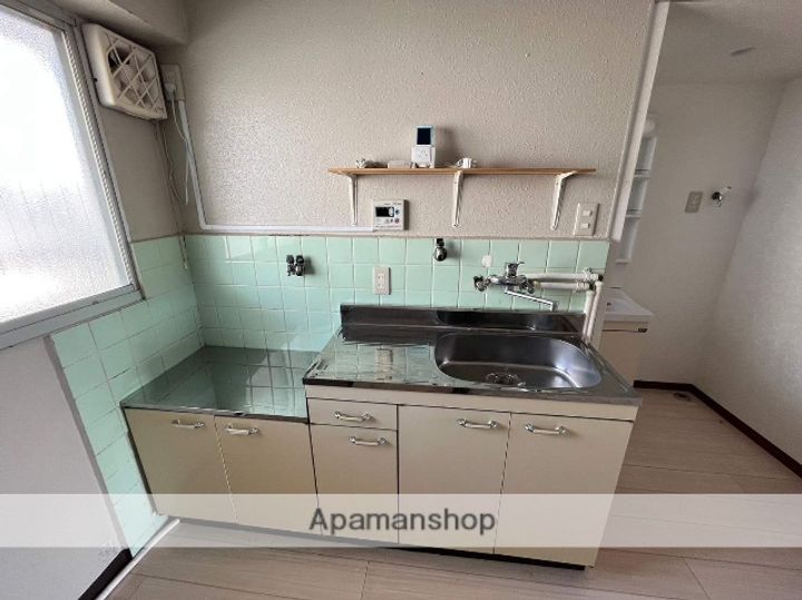 京都府京田辺市大住関屋の賃貸マンションのキッチン