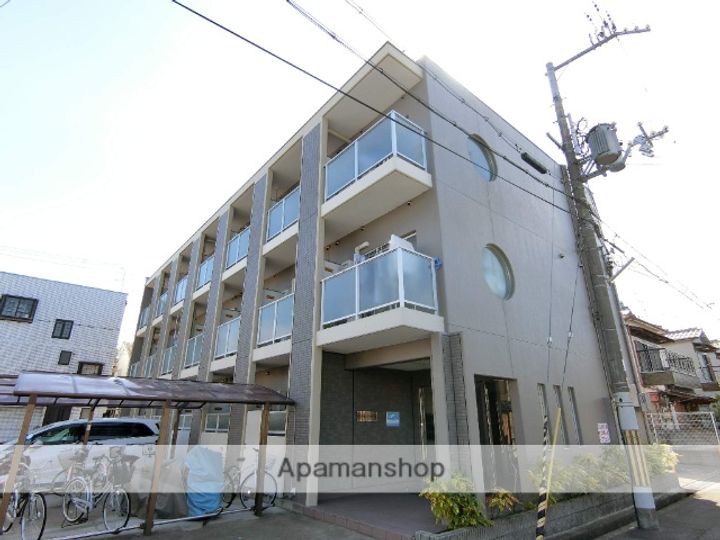 京都府城陽市枇杷庄大三戸の賃貸マンションの外観