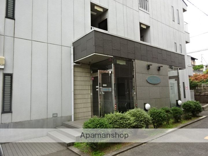 京都府京田辺市三山木上谷浦の賃貸アパートの外観