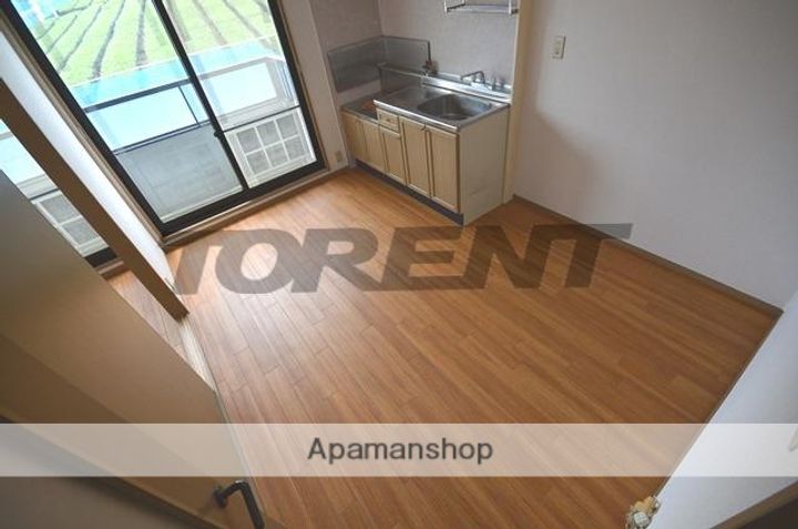 由福ハウス木幡B101の居間