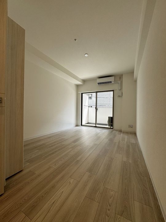 大阪府大阪市西区本田2丁目の賃貸マンションの居間