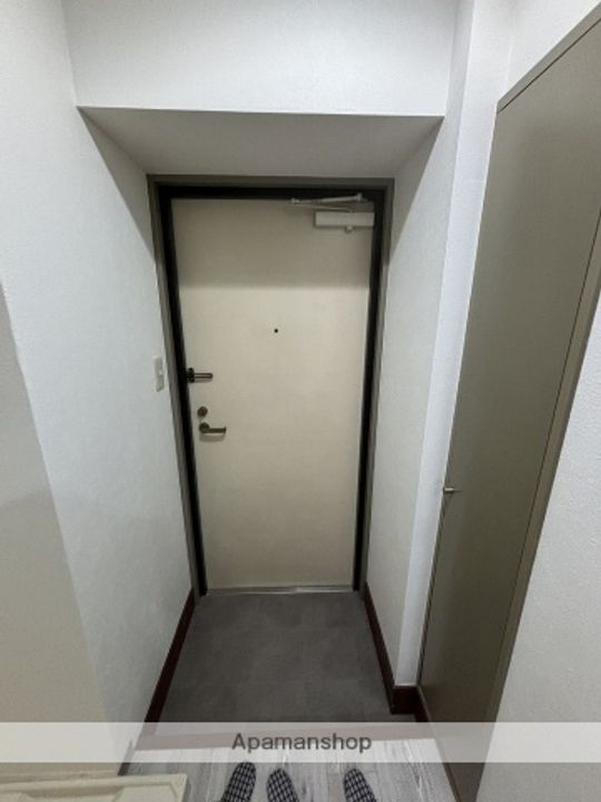 兎我野町聚楽マンションの玄関