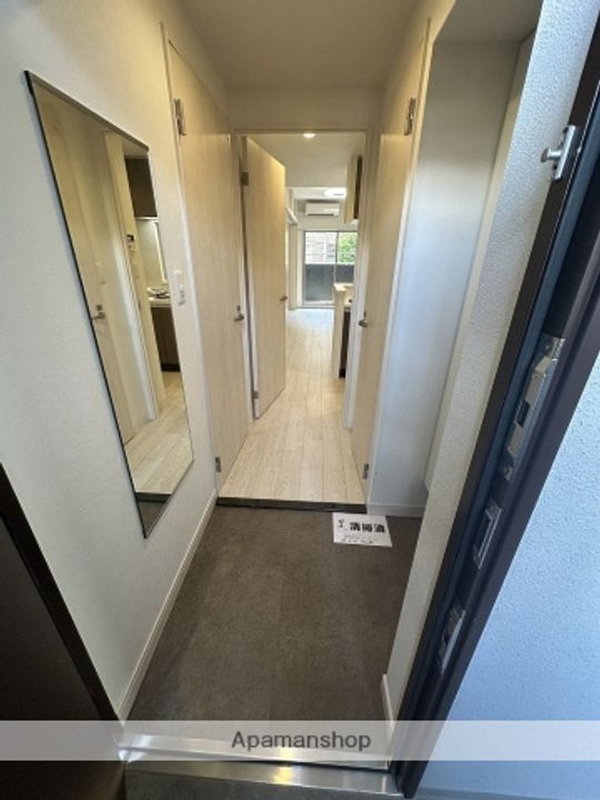 プレサンスNEO上新庄PRIMECRUISの玄関