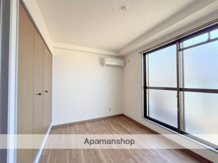 大阪府堺市西区鳳東町3丁の賃貸マンションの居間