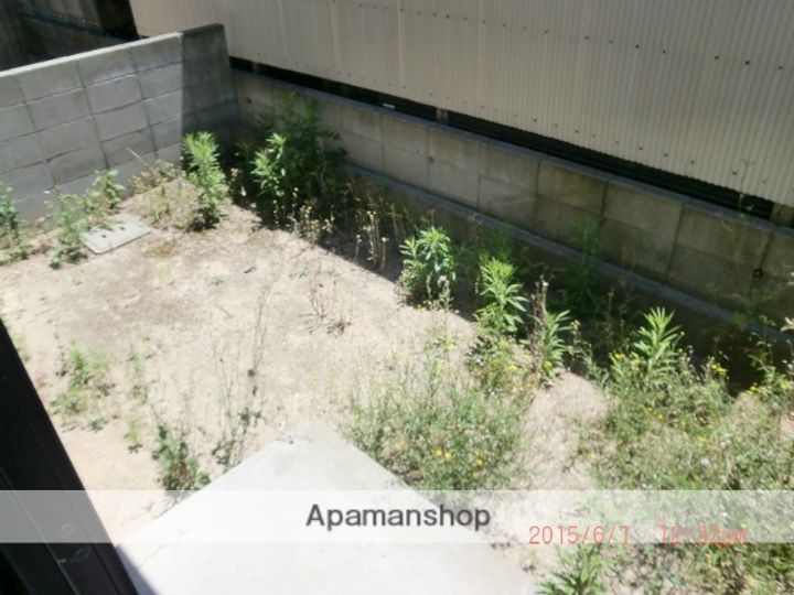 メゾン栄谷203の居間
