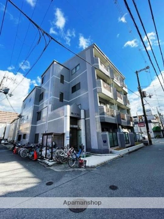 大阪府寝屋川市香里北之町の賃貸マンションの外観