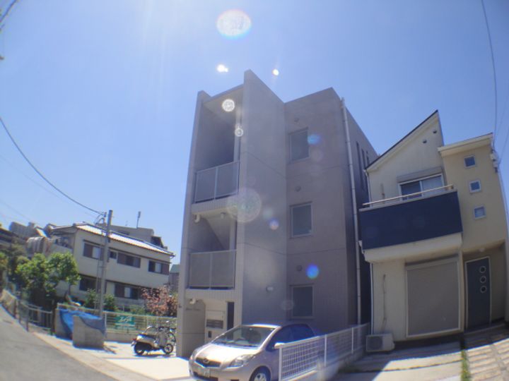 大阪府枚方市楠葉野田1丁目の賃貸マンション302号室の外観