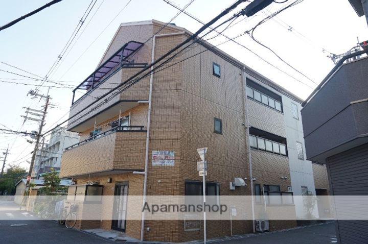 大阪府寝屋川市豊里町の賃貸マンションの外観