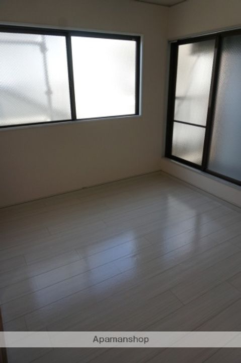 大阪府守口市八雲北町1丁目の賃貸マンションの居間