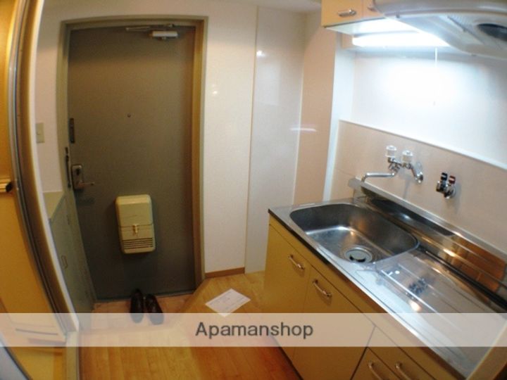 大阪府枚方市村野本町の賃貸マンションの玄関