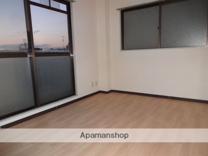 大阪府寝屋川市香里北之町の賃貸マンション303の居間