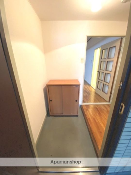 野田シャトルマンションAの玄関