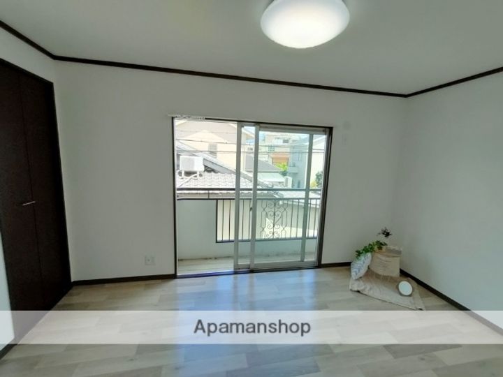 大阪府東大阪市金岡1丁目の賃貸アパートの居間