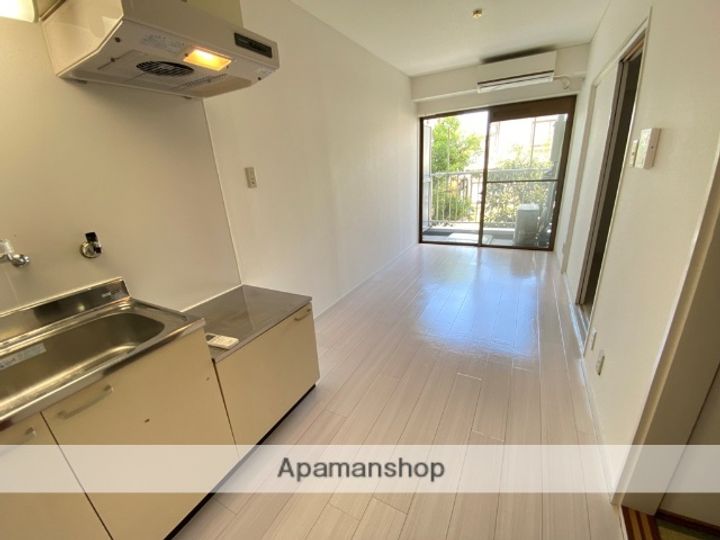 大阪府東大阪市川俣本町の賃貸マンションの居間