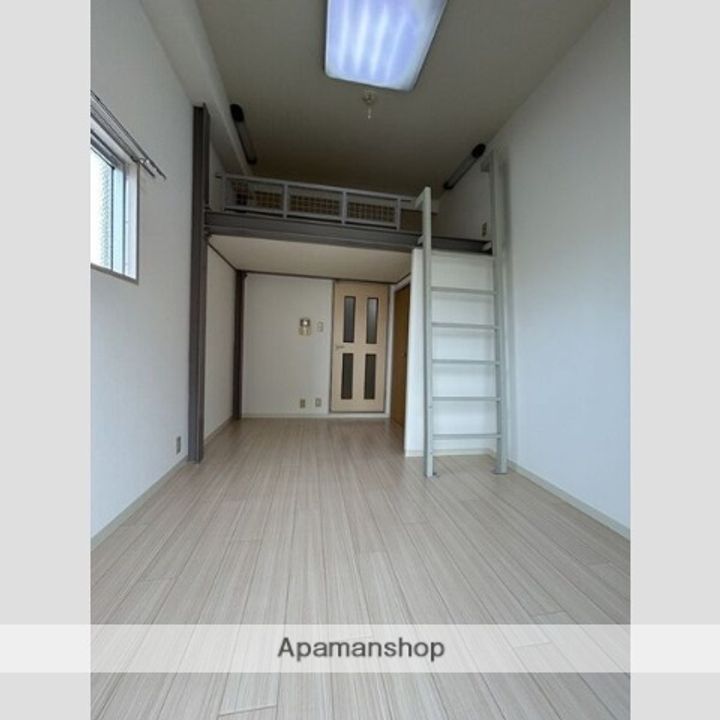 大阪府堺市北区中百舌鳥町6丁の賃貸マンションの居間