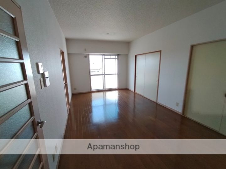 大阪府堺市東区丈六の賃貸マンションの居間