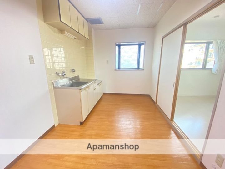 大阪府寝屋川市萱島東2丁目の賃貸マンションの居間