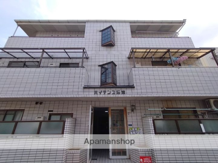 大阪府寝屋川市石津東町の賃貸マンションの外観