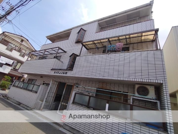 大阪府寝屋川市石津東町の賃貸マンションの外観