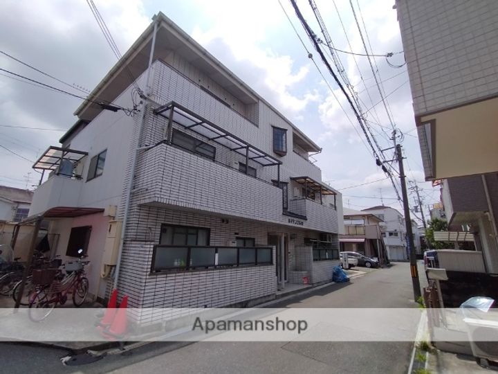 大阪府寝屋川市石津東町の賃貸マンションの外観