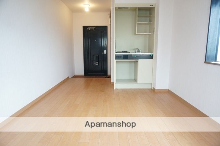 大阪府高槻市寿町1丁目の賃貸マンション303の居間