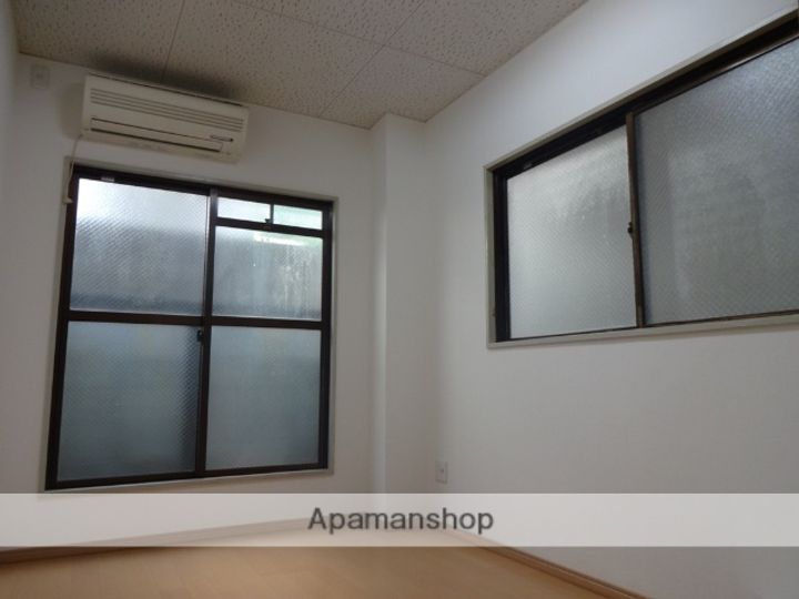 大阪府寝屋川市香里北之町の賃貸マンションの居間