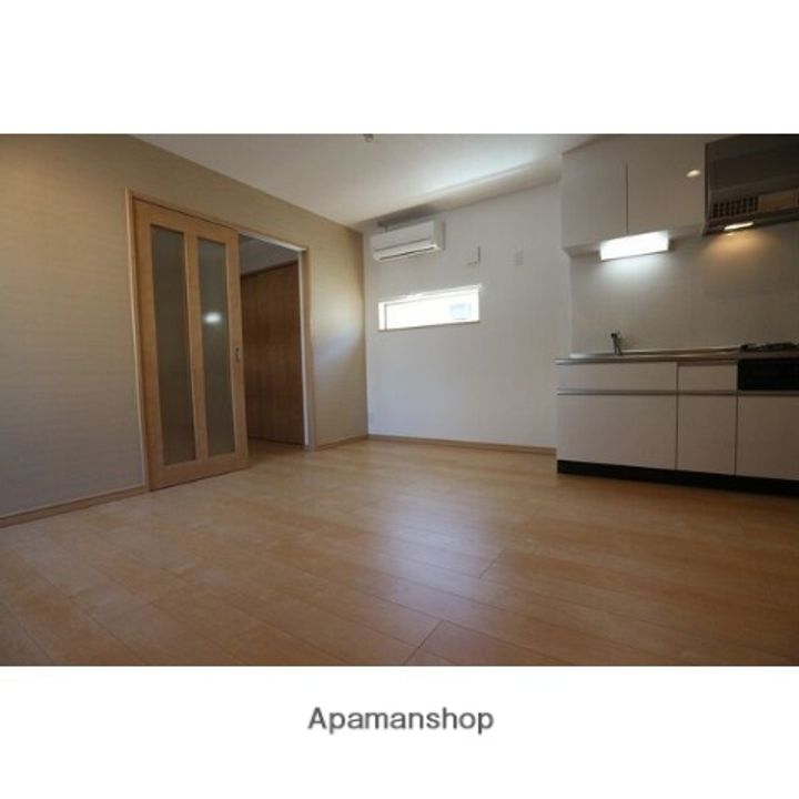 大阪府寝屋川市香里北之町の賃貸アパートの居間