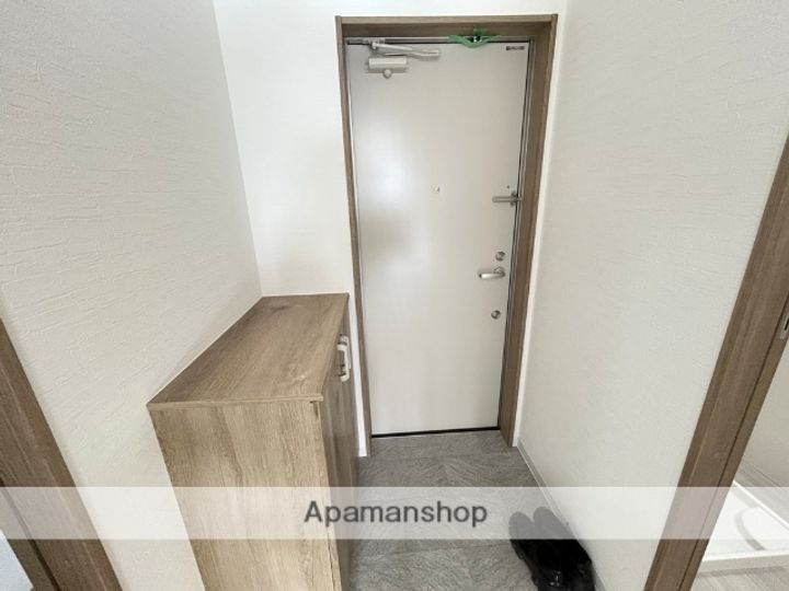 PERSIMMON香里園の玄関