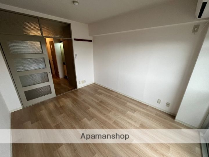 大阪府大阪市城東区野江1丁目の賃貸マンションの居間