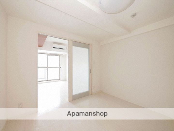 大阪府大阪市淀川区十三東3丁目の賃貸マンションの居間