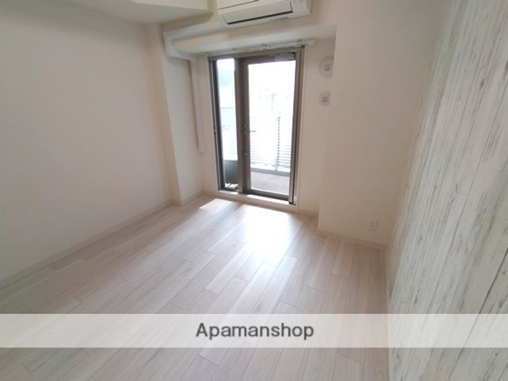 大阪府大阪市福島区吉野2丁目の賃貸マンションの居間