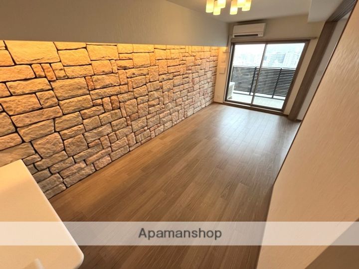 大阪府東大阪市高井田元町2丁目の賃貸マンションの居間