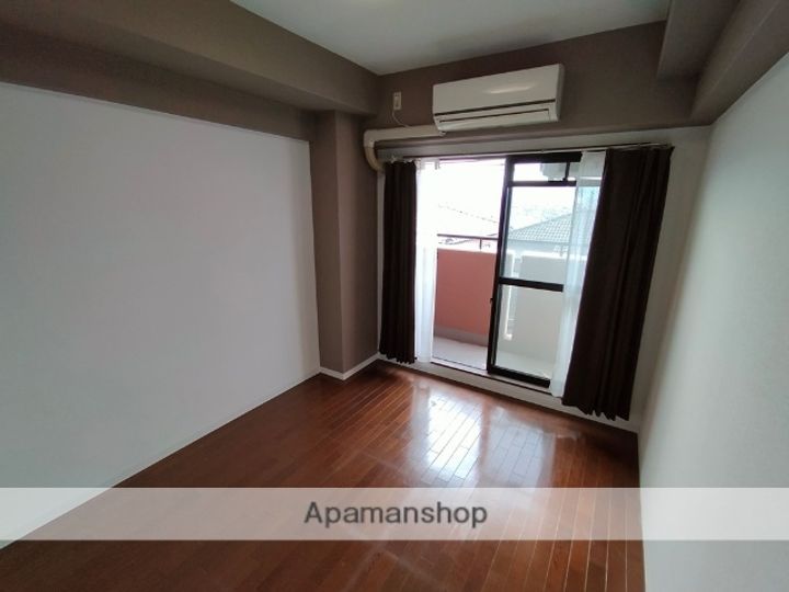 グリンヒルズ302の居間