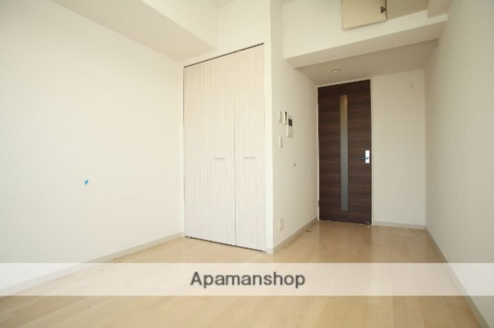 大阪府大阪市北区長柄東3丁目の賃貸マンションの居間