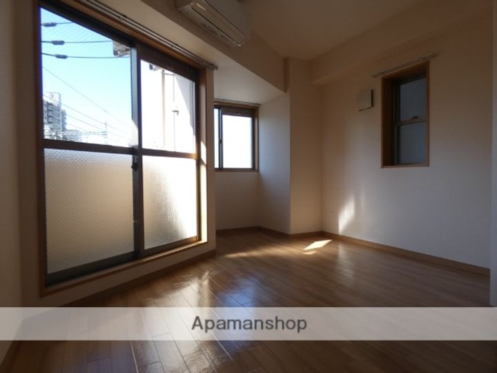 大阪府大阪市福島区福島7丁目の賃貸マンションの居間