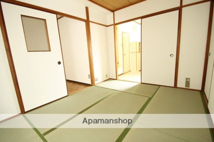 大阪府豊中市庄内幸町2丁目の賃貸マンションの居間