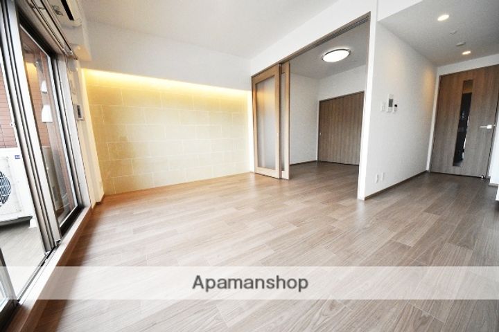 大阪府大阪市淀川区新高2丁目の賃貸マンションの居間