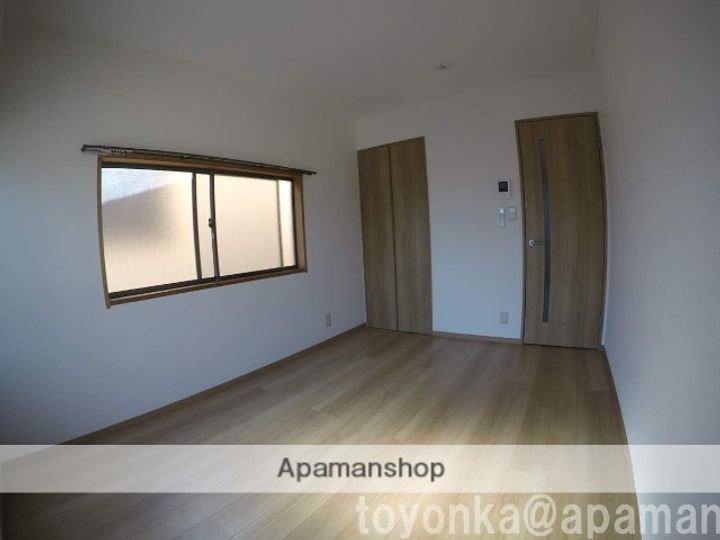 大阪府豊中市玉井町1丁目の賃貸アパート206の居間